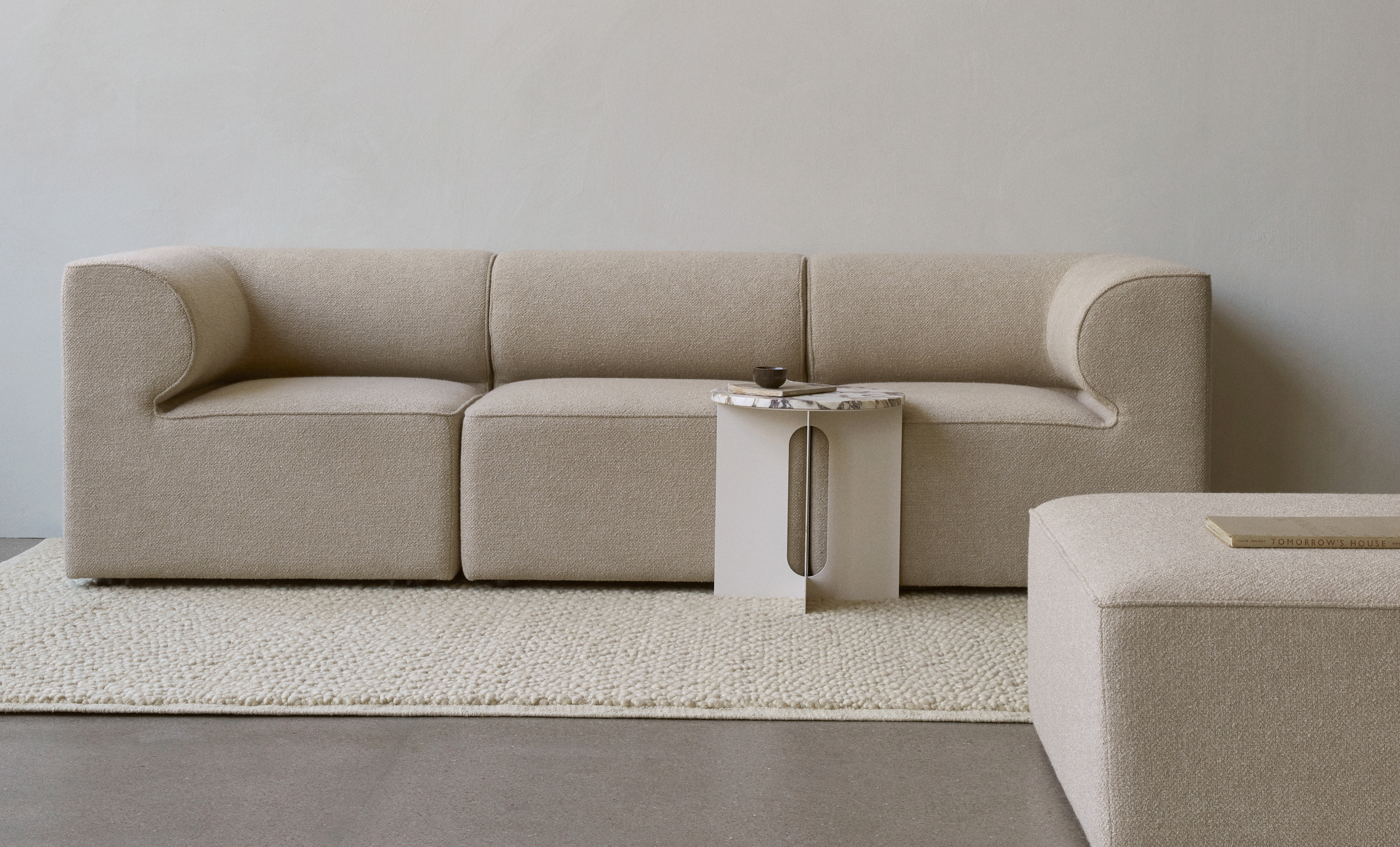 menu-eave-modular-sofa-boucle-eave-modular-pouf-androgyne-side-table-nndw-gravel-rug-1