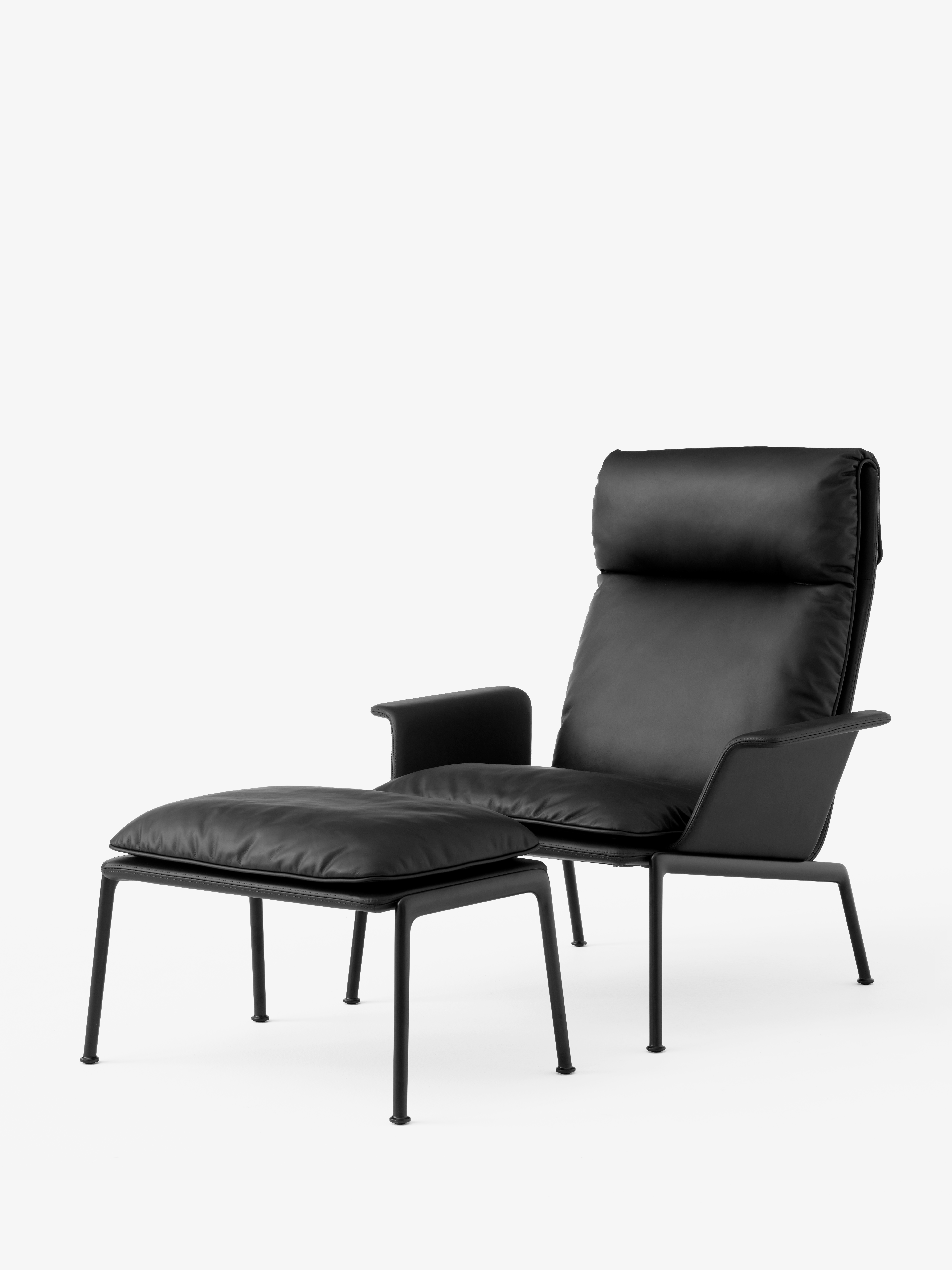 muno-lounge-chair-ln17-warm-black-legs-w-noble-leather-muno-footstool-ln20-warm-black-legs-w-noble-leather-black-angled-front