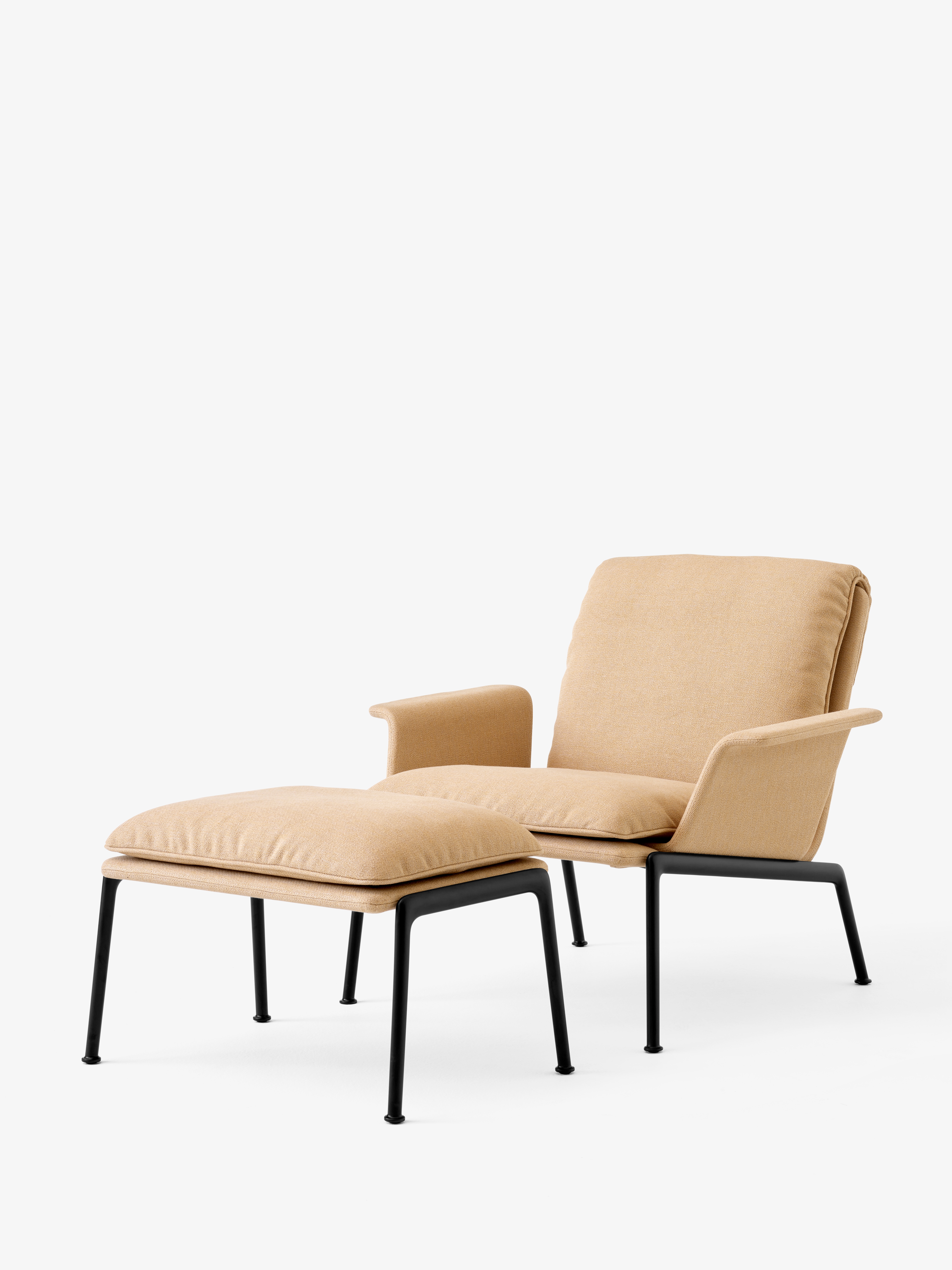 muno-lounge-chair-ln19-warm-black-legs-w-clay-0007-muno-footstool-ln20-warm-black-legs-w-clay-0007-angled-front